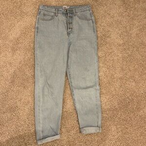 Size 4 Princess polly light wash denim jeans with cuffs at bottom.